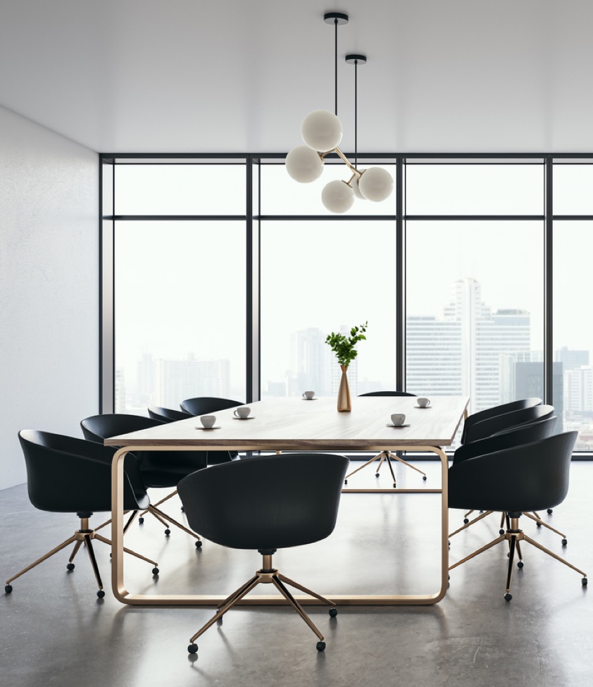 Side view of modern luxury meeting room interior with office desk and chairs, panoramic window, white wall and concrete floor.